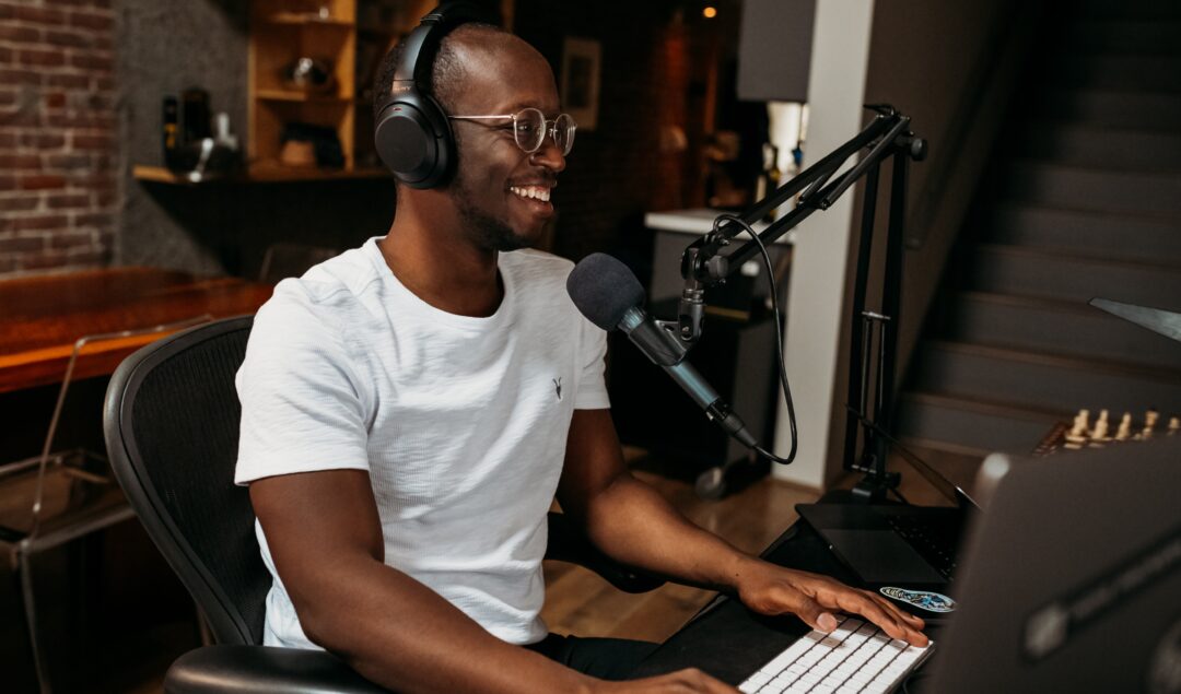 Black man recording podcast