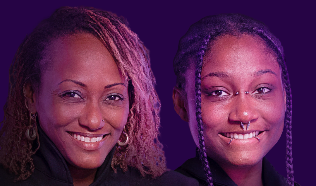 Black mother, 46, and her daughter, 18. Mother has short sister locs and a nose ring, she is smiling at the camera. The daughter has braids and several facial piercings. She is also smiling at the camera. The photo has a purple hue.